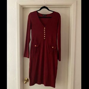Maroon Long Sleeve Dress with Pockets. Gold Button Accessory.